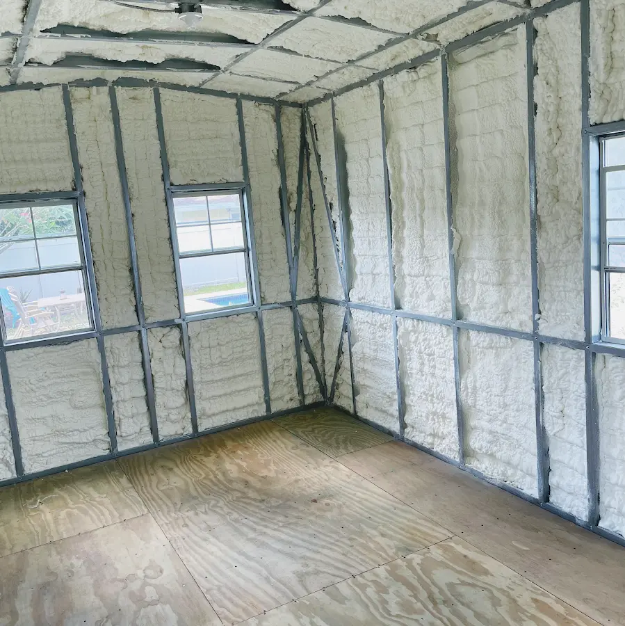 Closed-cell spray foam insulation applied to wall cavities in a residential project in Pell City